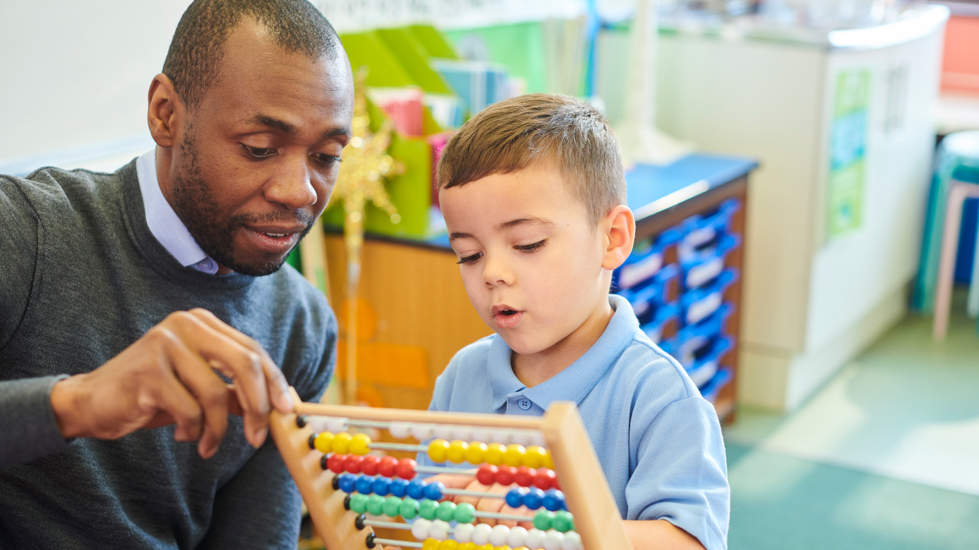 Teacher and pupil counting in 2s, 5s, 10s and 3s with Tes resource